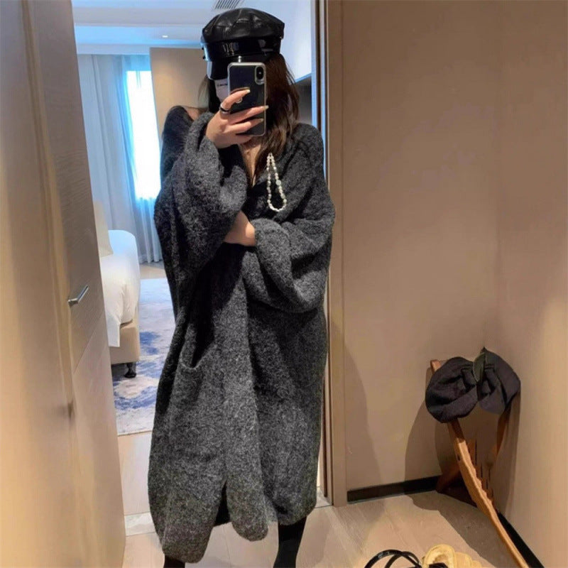 Kvinnors fluffiga cardigan med stora fickor och lös passform Mirla-Eva Jonsson