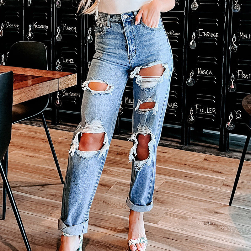 Kvinnors förstörda pojkvänsjeans i en avslappnad skärning med hög midja Mirla-Eva Jonsson