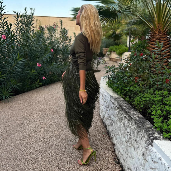 Kvinnors fransad kjol med glittrande detaljer och elastiskt midjeband Mirla-Eva Jonsson