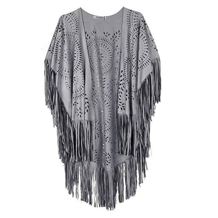 Kvinnors fransad, lätt kimono gjord av kunstläder med utskärningsmönster-Eva Jonsson
