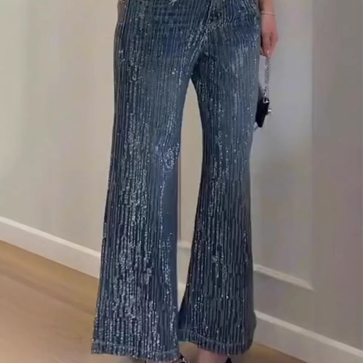 Kvinnors glittrande breda jeans med elegant textur Mirla-Eva Jonsson