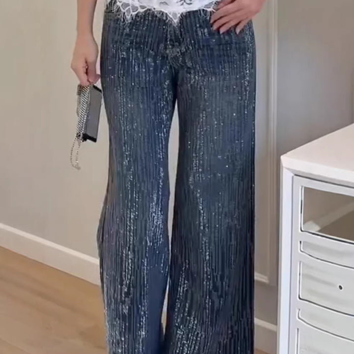 Kvinnors glittrande breda jeans med elegant textur Mirla-Eva Jonsson