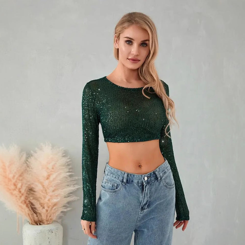 Kvinnors glittrande crop top med långa ärmar och figurnära snitt-Eva Jonsson