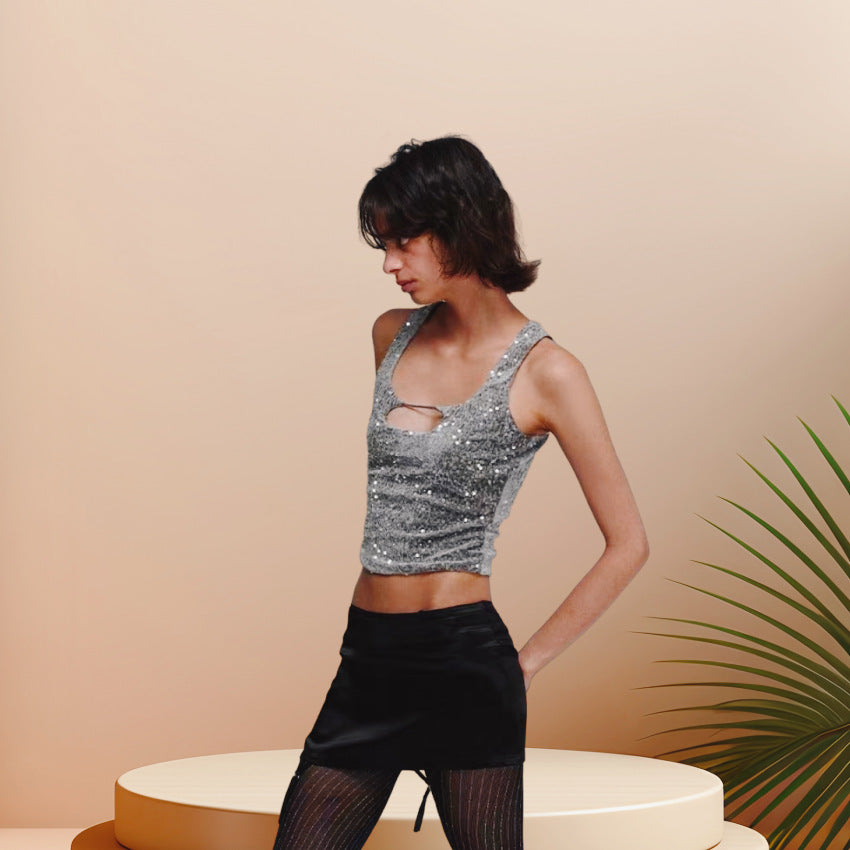 Kvinnors glittrande crop top med skimrande effekt och rundad halsringning Mirla-Eva Jonsson