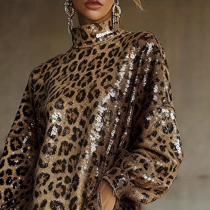 Kvinnors glittrande kort klänning med leopardtryck och fransar Mirla-Eva Jonsson