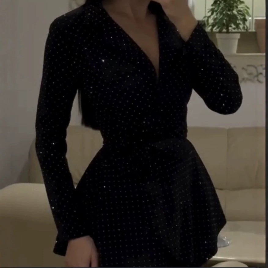 Kvinnors glittrande skjortklänning med voluminös fåll och elegant skrädderi-Eva Jonsson