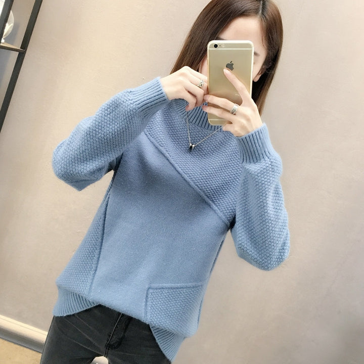 Kvinnors högaxlad pullover med texturerad design Mirla-Eva Jonsson
