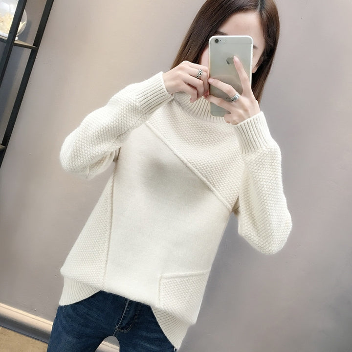 Kvinnors högaxlad pullover med texturerad design Mirla-Eva Jonsson