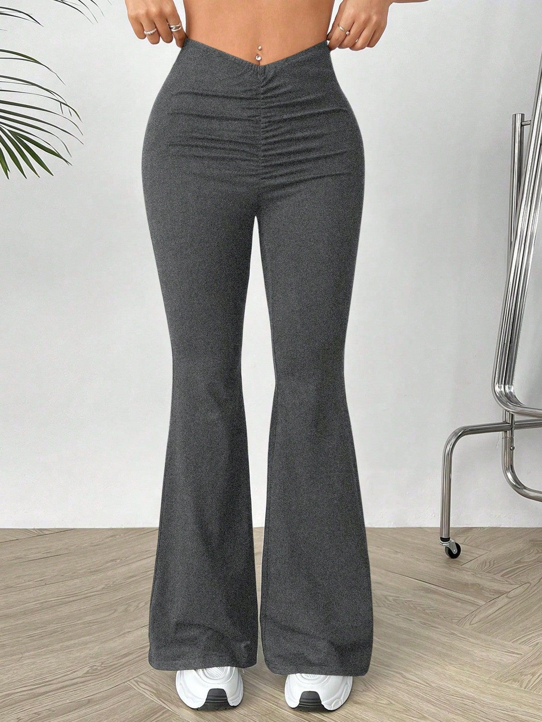 Kvinnors högmidjade bootcut byxor Mirla-Eva Jonsson