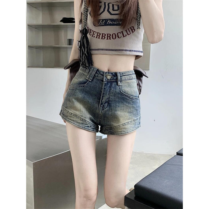 Kvinnors högmidjade denimshorts med fransar-Eva Jonsson