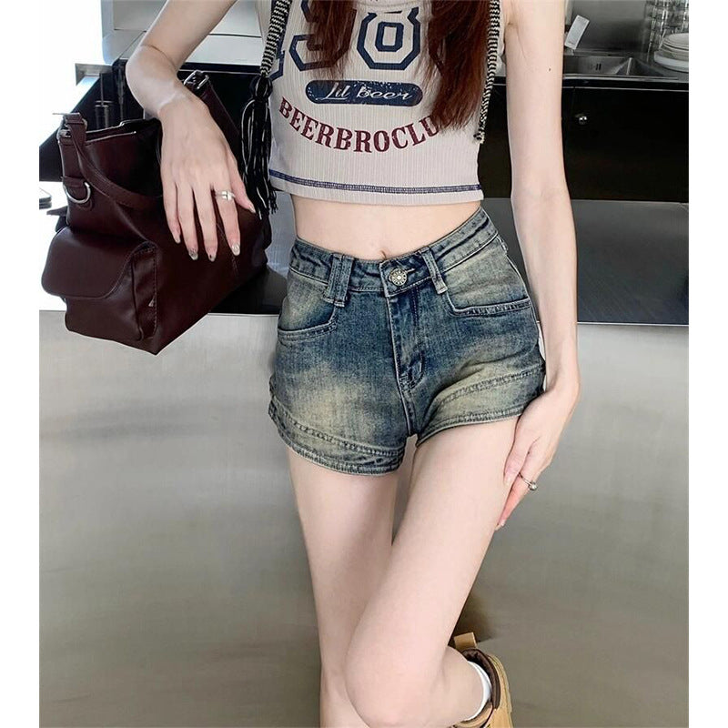 Kvinnors högmidjade denimshorts med fransar-Eva Jonsson