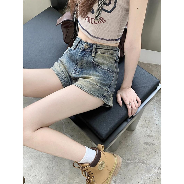 Kvinnors högmidjade denimshorts med fransar-Eva Jonsson