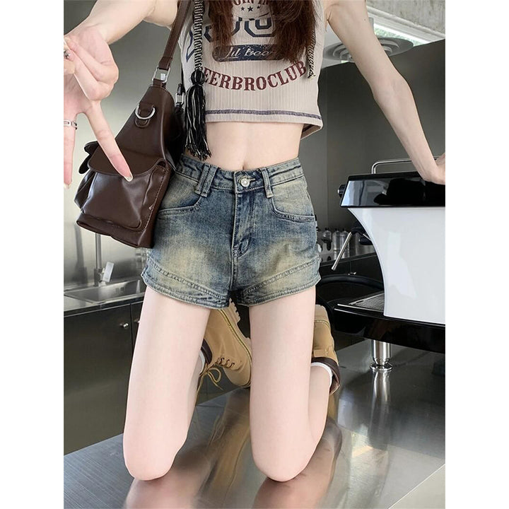 Kvinnors högmidjade denimshorts med fransar-Eva Jonsson