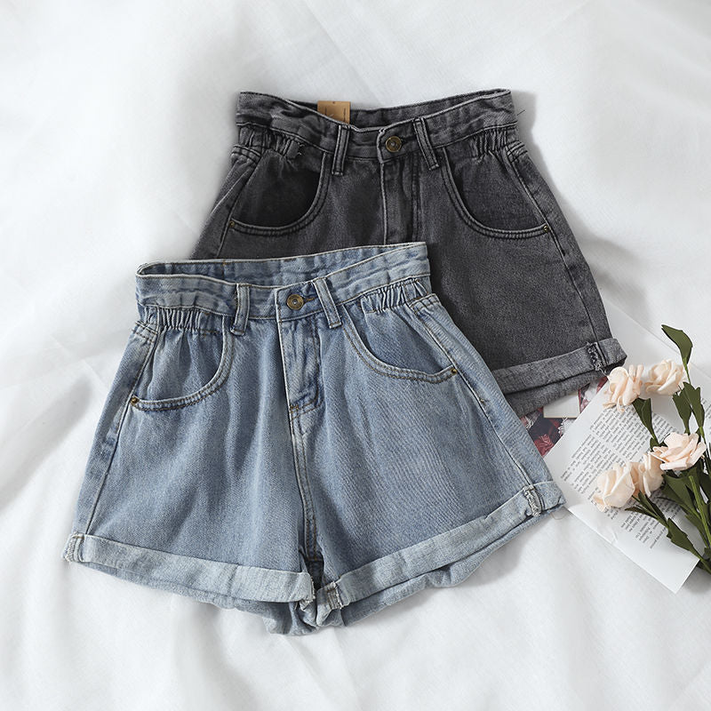 Kvinnors högmidjade denimshorts med konvertibel fåll och elastisk midja Mirla-Eva Jonsson
