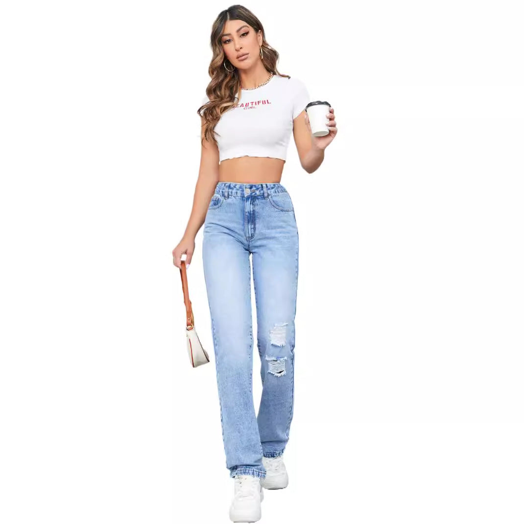 Kvinnors högmidjade jeans i en avslappnad vintage-stil med en snygg förstörd effekt Mirla-Eva Jonsson