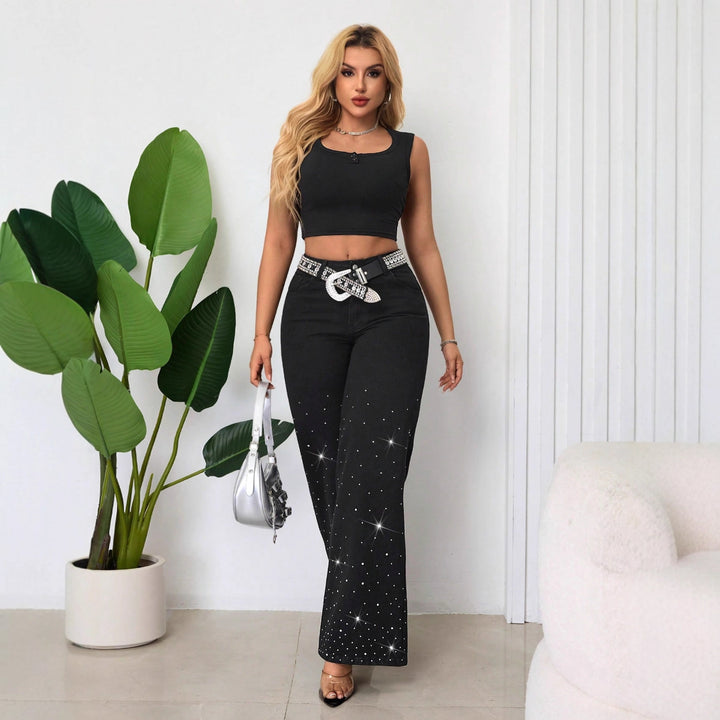 Kvinnors högmidjade jeans med glittrande rhinestones och bred passform Mirla-Eva Jonsson