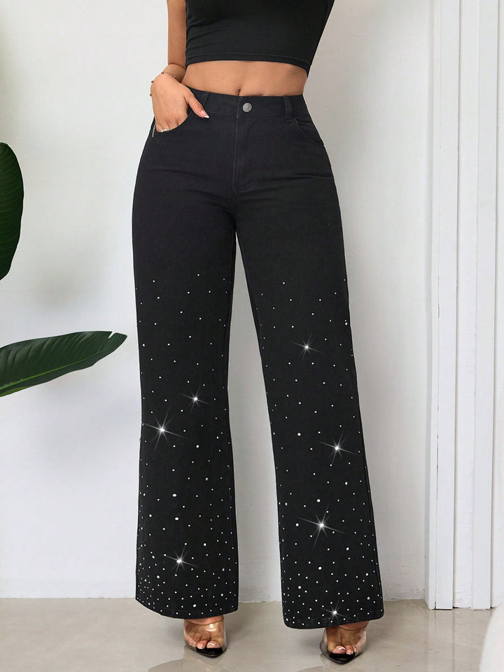 Kvinnors högmidjade jeans med glittrande rhinestones och bred passform Mirla-Eva Jonsson