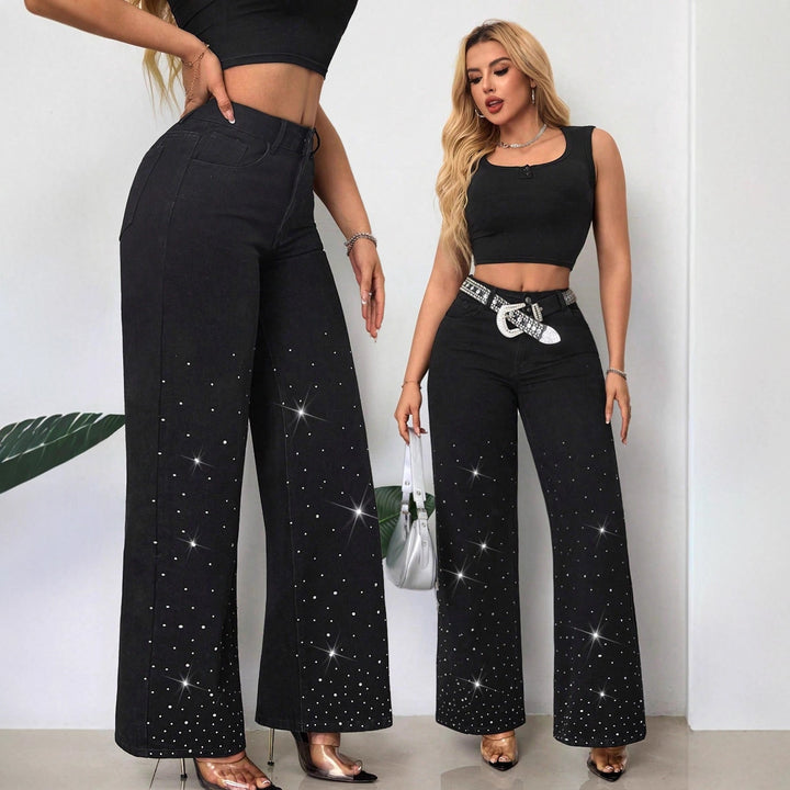 Kvinnors högmidjade jeans med glittrande rhinestones och bred passform Mirla-Eva Jonsson
