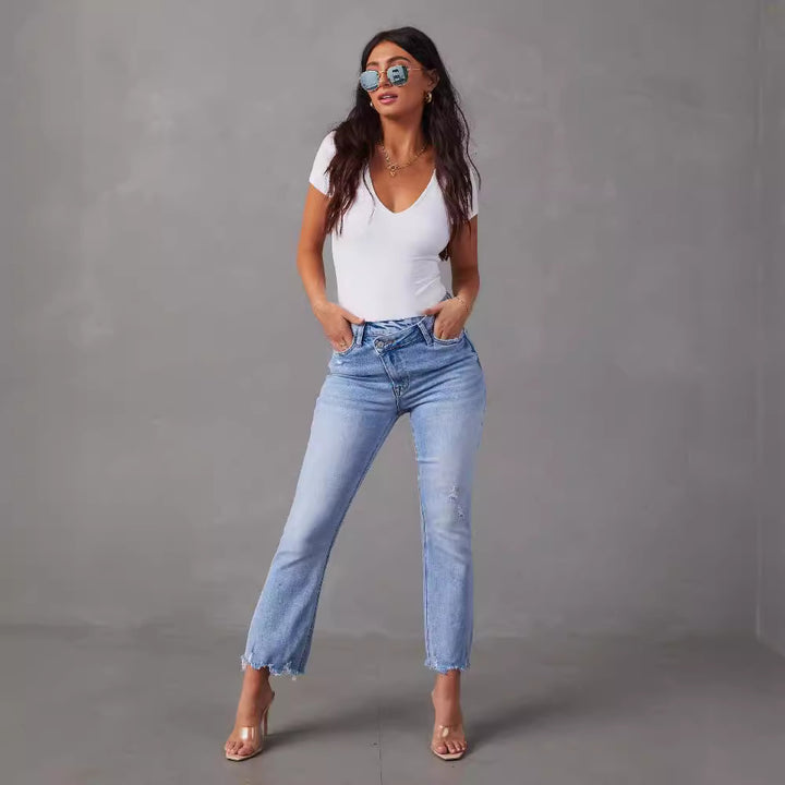 Kvinnors högmidjade jeans med trendiga fransar och slitna detaljer Mirla-Eva Jonsson