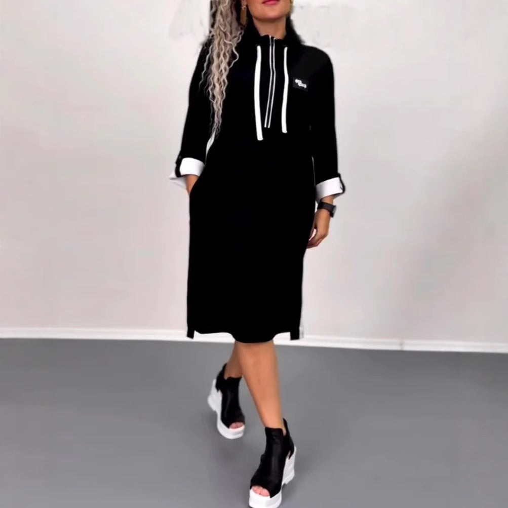 Kvinnors hoodie-klänning med sidofickor och stiligt färgkontrast Mirla-Eva Jonsson