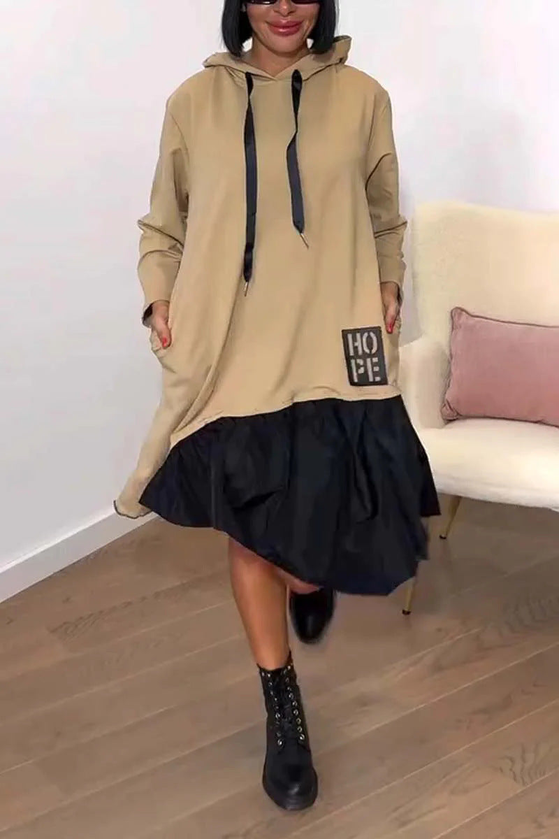 Kvinnors hoodie klänning med voluminös kjol och praktiska fickor Mirla-Eva Jonsson