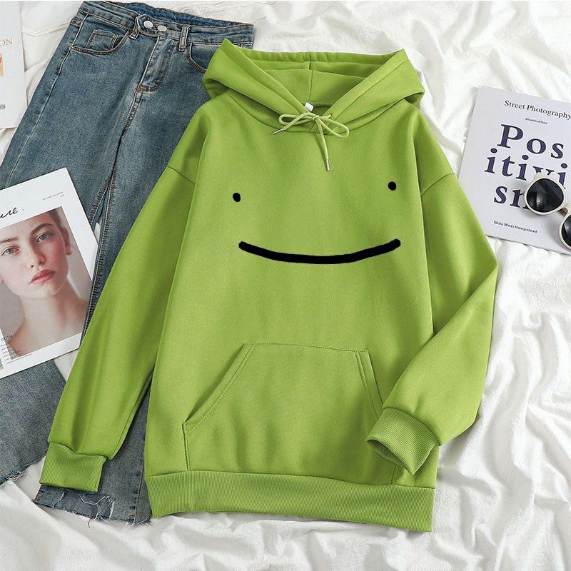 Kvinnors hoodie med avslappnad smiley-design Mirla-Eva Jonsson