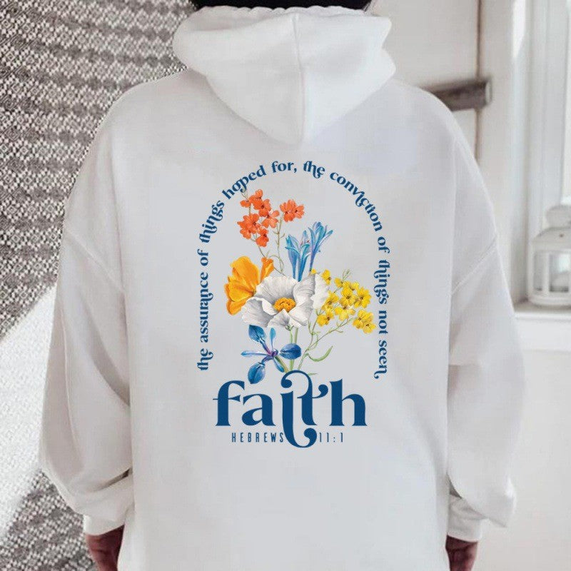 Kvinnors hoodie med blommig lettering och inspirerande design Mirla-Eva Jonsson