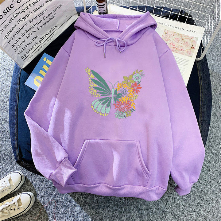 Kvinnors hoodie med blommigt fjärilsdesign Mirla-Eva Jonsson
