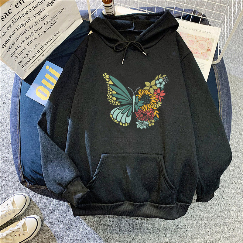 Kvinnors hoodie med blommigt fjärilsdesign Mirla-Eva Jonsson