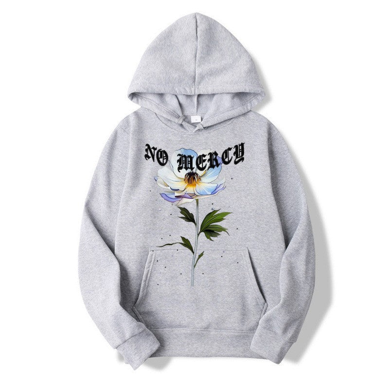 Kvinnors hoodie med blommigt tryck och framträdande text Mirla-Eva Jonsson