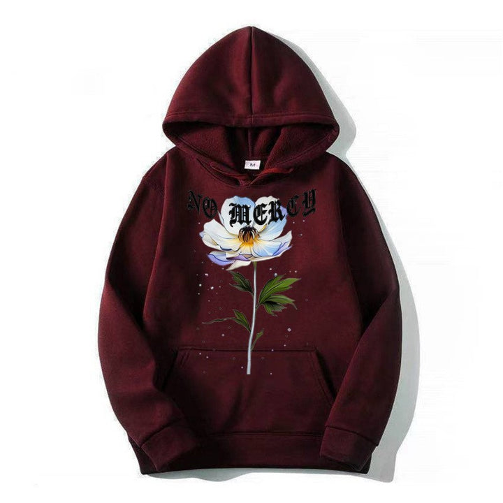 Kvinnors hoodie med blommigt tryck och framträdande text Mirla-Eva Jonsson