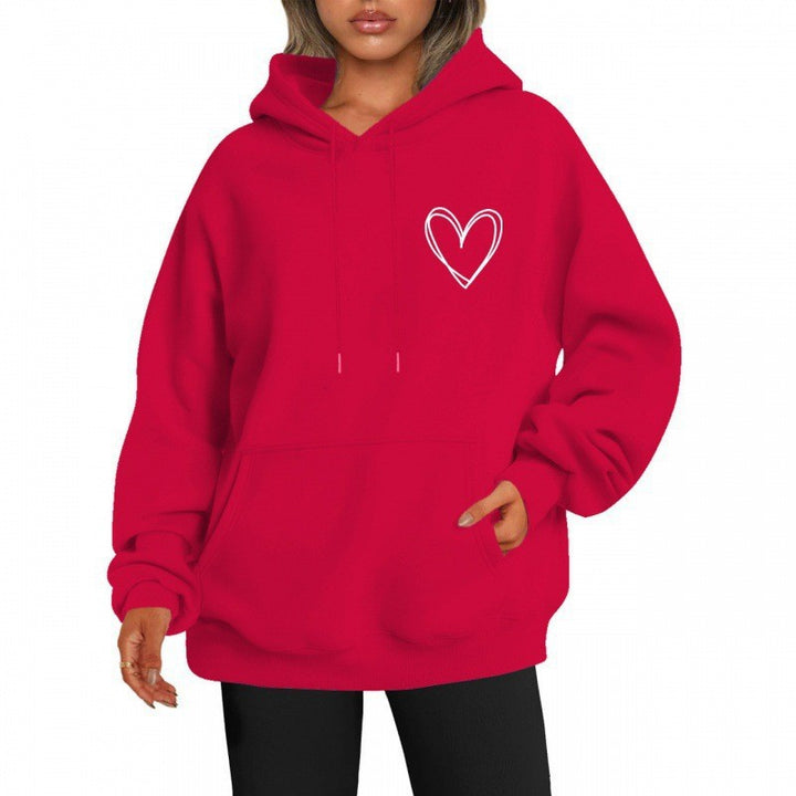 Kvinnors hoodie med coolt hjärtmotiv Mirla-Eva Jonsson