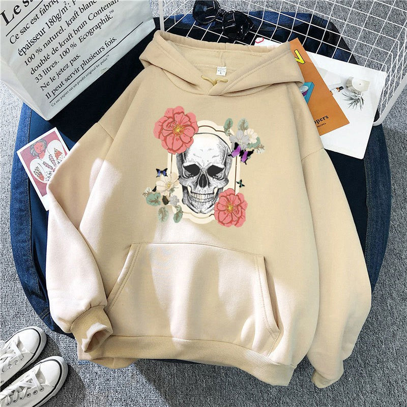 Kvinnors hoodie med detaljerad skalledesign och blommönster Mirla-Eva Jonsson