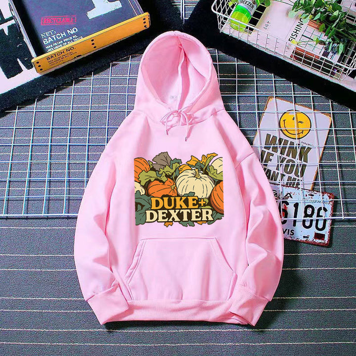Kvinnors hoodie med glad pumpamotif Mirla-Eva Jonsson
