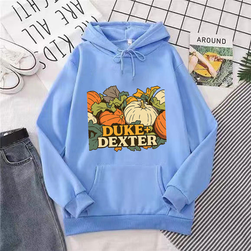 Kvinnors hoodie med glad pumpamotif Mirla-Eva Jonsson