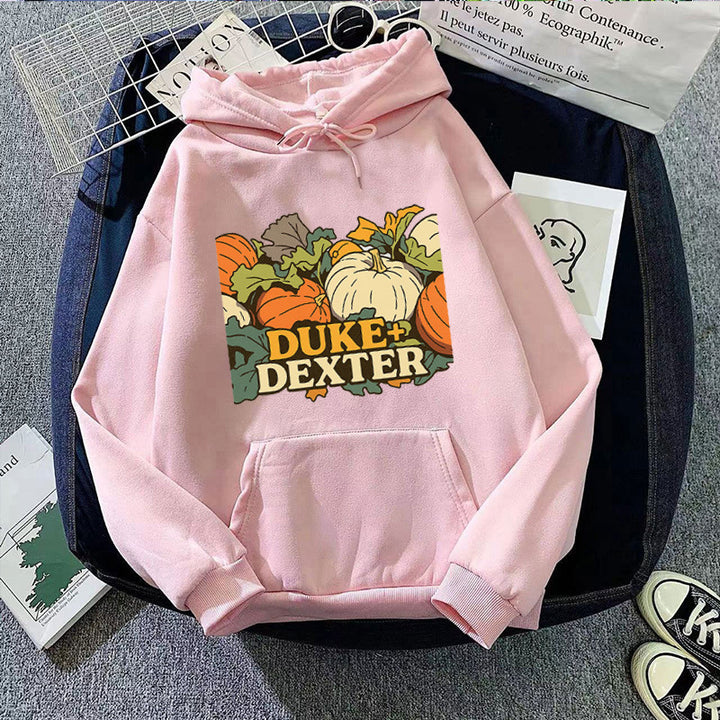 Kvinnors hoodie med glad pumpamotif Mirla-Eva Jonsson