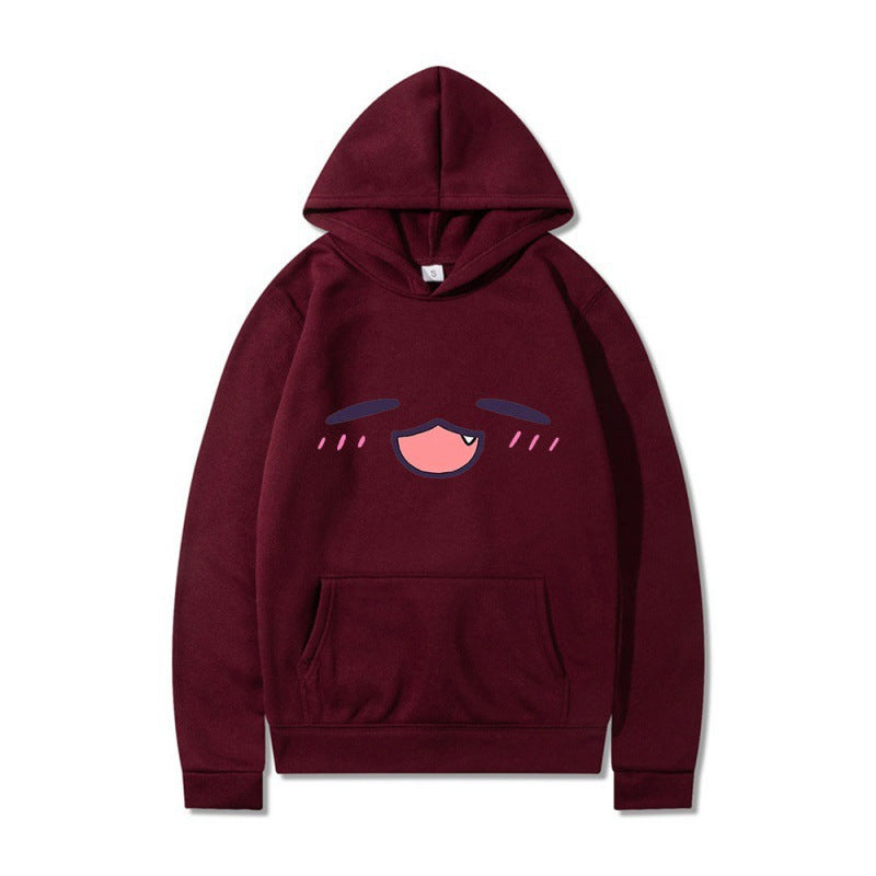 Kvinnors hoodie med glad tecknad ansikte och bekväm passform Mirla-Eva Jonsson