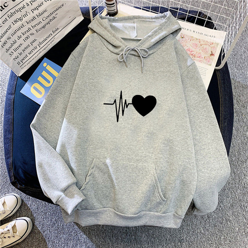 Kvinnors hoodie med hjärtslagmotivet Mirla-Eva Jonsson