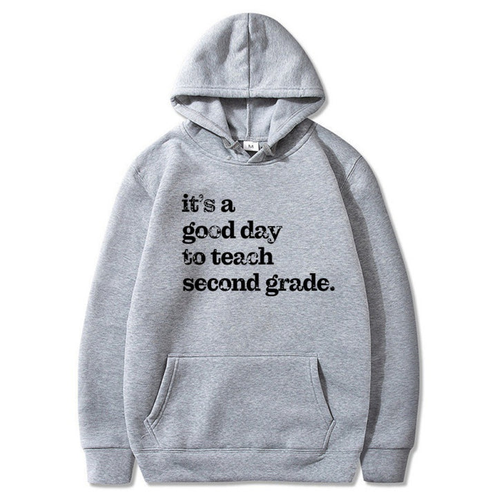 Kvinnors hoodie med inspirerande lärarcitat och bekväm passform Mirla-Eva Jonsson