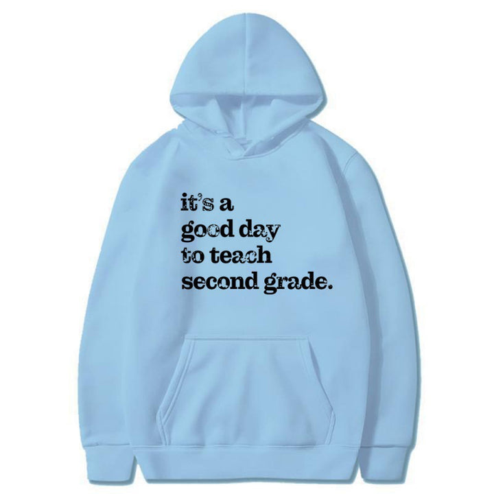 Kvinnors hoodie med inspirerande lärarcitat och bekväm passform Mirla-Eva Jonsson