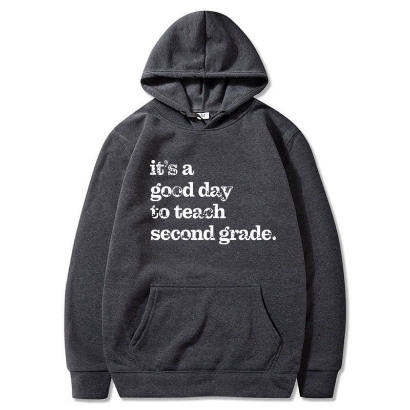 Kvinnors hoodie med inspirerande lärarcitat och bekväm passform Mirla-Eva Jonsson