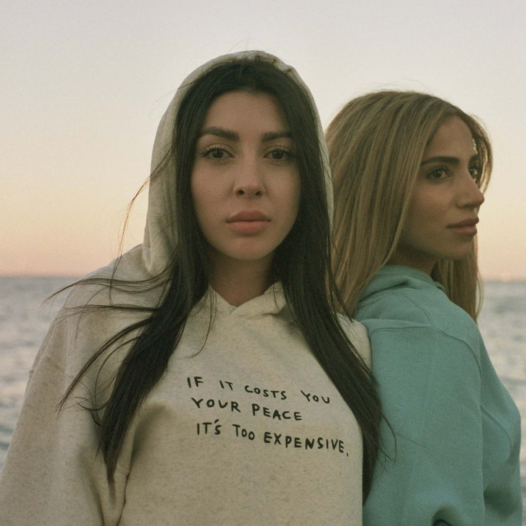 Kvinnors hoodie med inspirerande motiv Mirla-Eva Jonsson