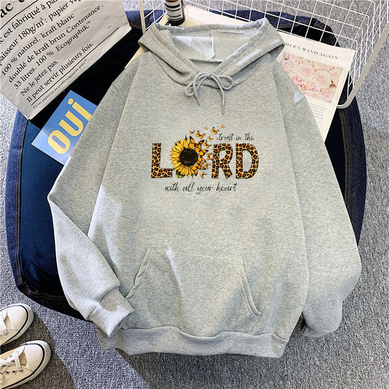 Kvinnors hoodie med inspirerande solrosdesign Mirla-Eva Jonsson
