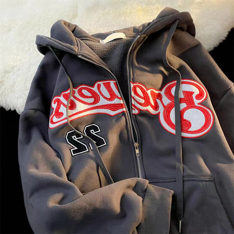 Kvinnors hoodie med iögonfallande broderad tryck Mirla-Eva Jonsson