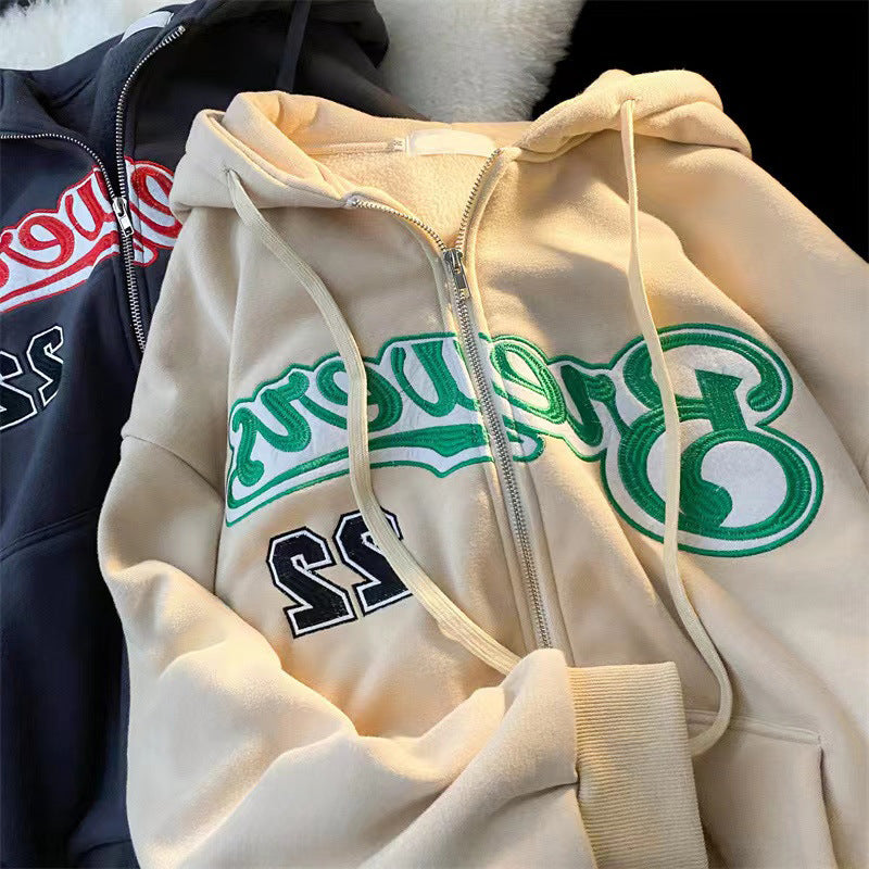 Kvinnors hoodie med iögonfallande broderad tryck Mirla-Eva Jonsson