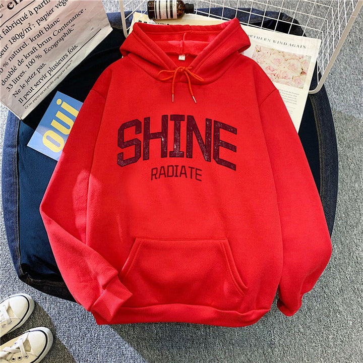 Kvinnors hoodie med iögonfallande text Mirla-Eva Jonsson