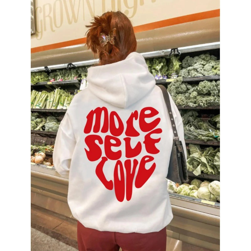 Kvinnors hoodie med iögonfallande tryck och oversized passform Mirla-Eva Jonsson