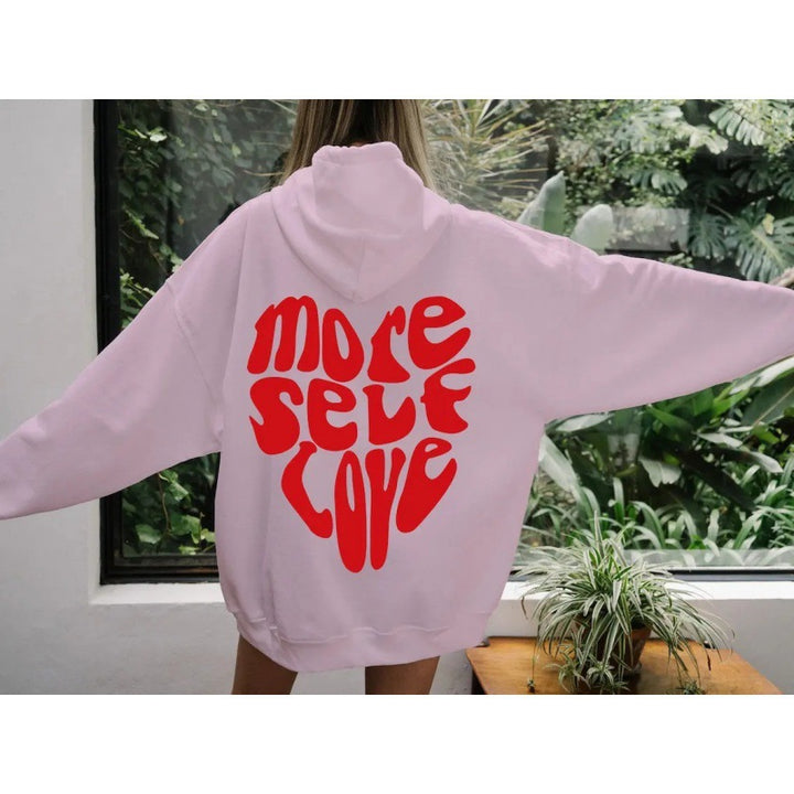 Kvinnors hoodie med iögonfallande tryck och oversized passform Mirla-Eva Jonsson