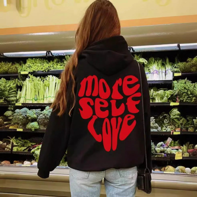 Kvinnors hoodie med iögonfallande tryck och oversized passform Mirla-Eva Jonsson