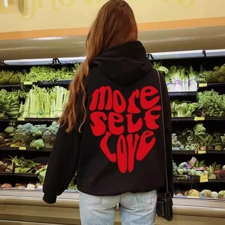 Kvinnors hoodie med iögonfallande tryck och oversized passform Mirla-Eva Jonsson